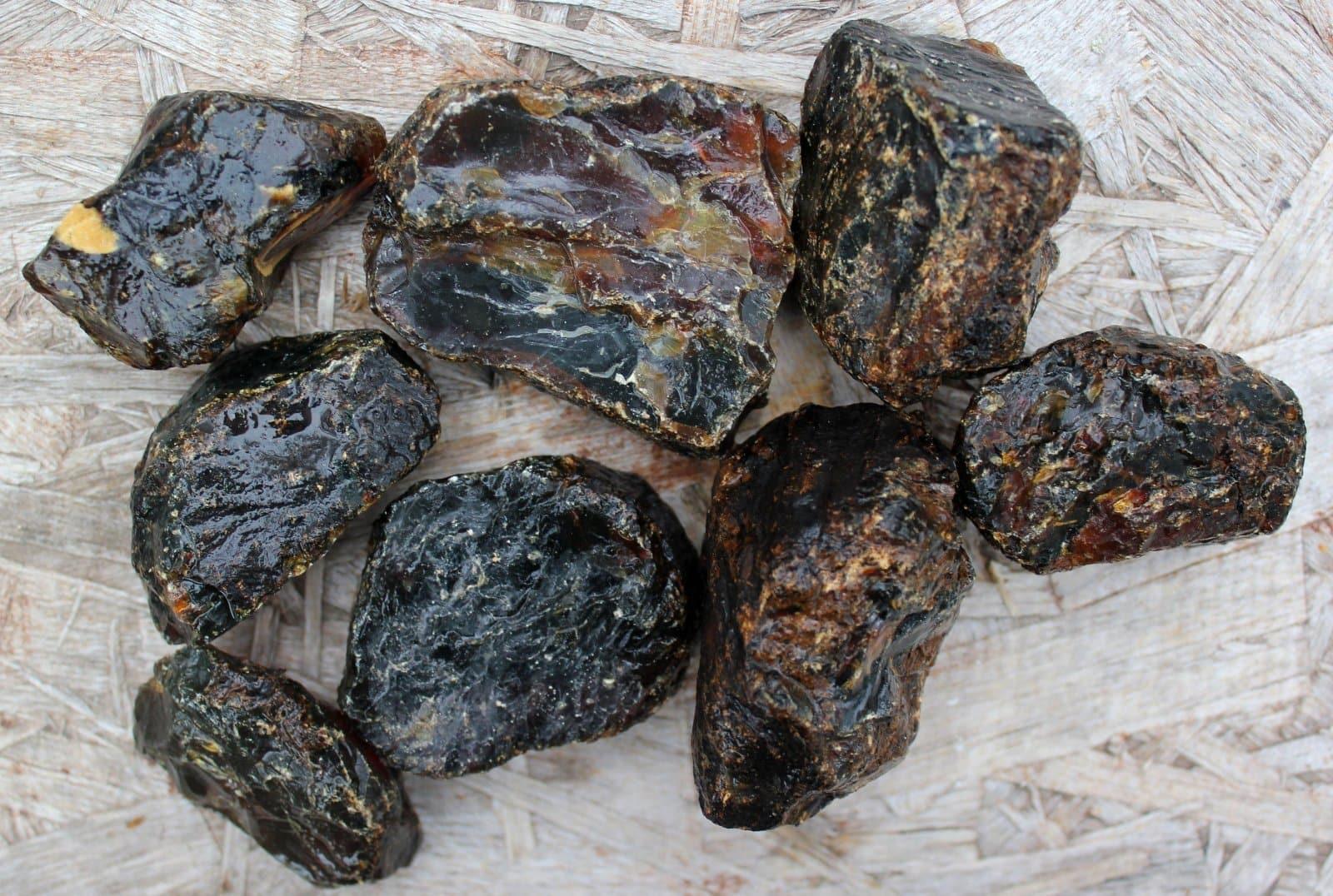 2 indonesian black amber medium sized rough raw chunk! - LapidaryCentral Fossil Amber