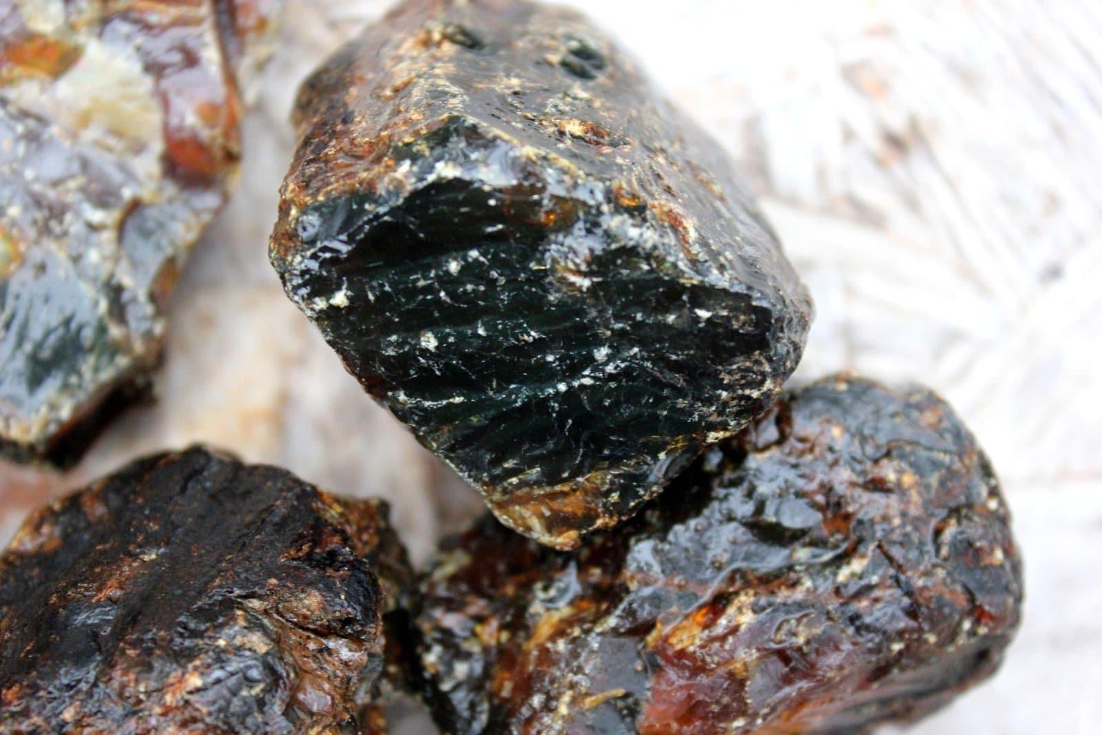 2 indonesian black amber medium sized rough raw chunk! - LapidaryCentral